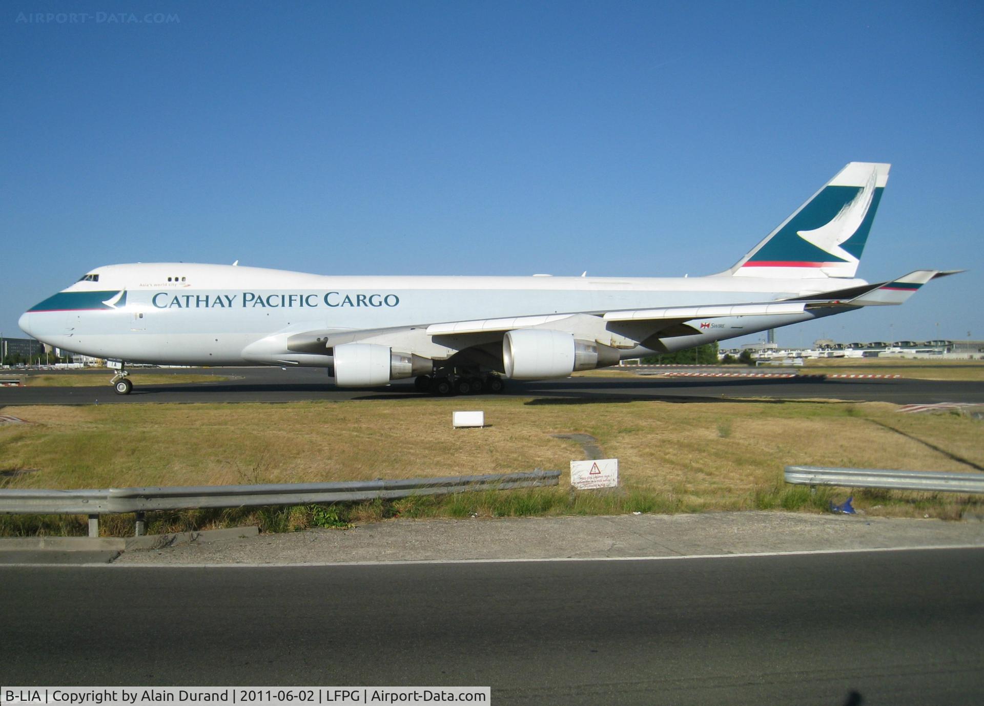 B-LIA, 2008 Boeing 747-467ERF C/N 37299/1404, The selection of 400Fs operated by Cathay Pacific Cargo range from converted BCFs to genuine freighters. Part of the latters, India-Lima was taxying to runway 09 from the freight ramp when pictured.