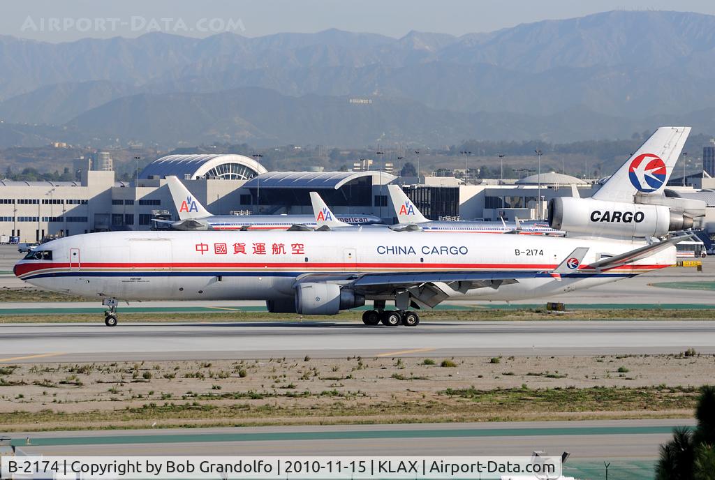 B-2174, McDonnell Douglas MD-11F C/N 48498, 25Left arrival