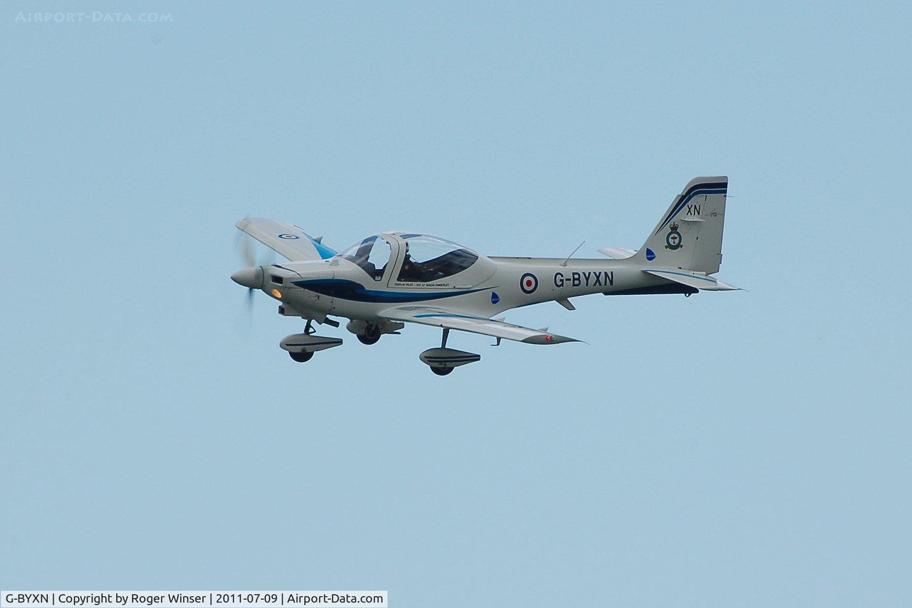 G-BYXN, 2001 Grob G-115E Tutor T1 C/N 82174/E, Off airport. Coded XN displaying at the Wales National Airshow, Swansea Bay, Wales, UK.
