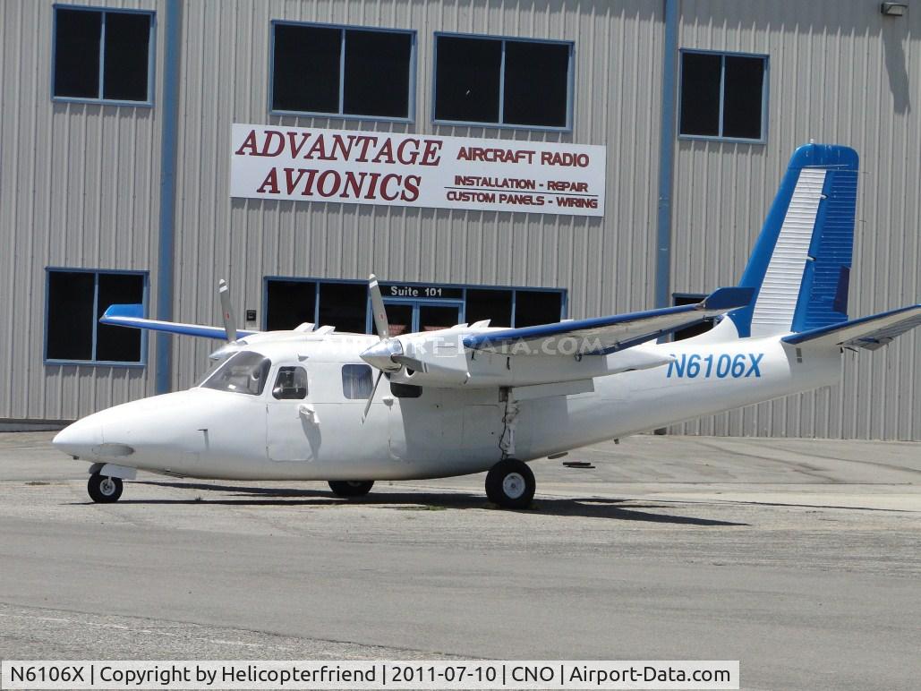 N6106X, 1960 Aero Commander 500-B C/N 500B-941-28, Parked east of Advantage Electronics