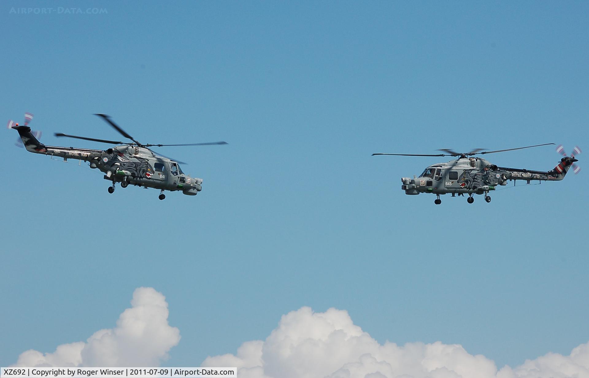 XZ692, 1979 Westland Lynx HMA.8SRU C/N 121, Off airport. Coded 641. With XZ722 coded 645 of 702 NAS's Black Cats Display Team at the Wales National Airshow, Swansea Bay, Wales, UK