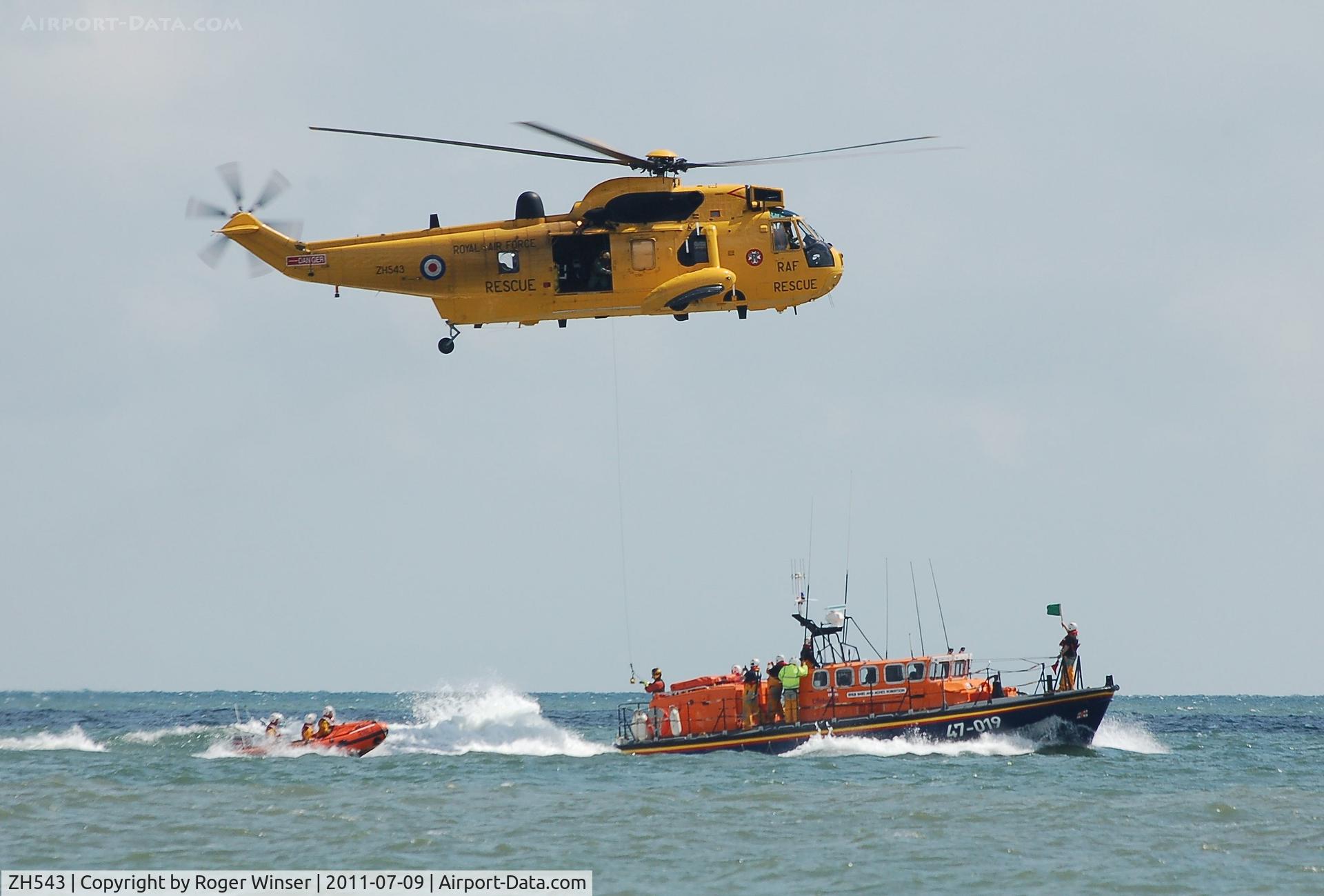 ZH543, Westland Sea King HAR.3A C/N WA1009, Off airport. Sea King rescue helicopter of 22 Squadron RAF operating with the Mumbles Lifeboat at the Wales National Airshow, Swansea Bay, Wales, UK.