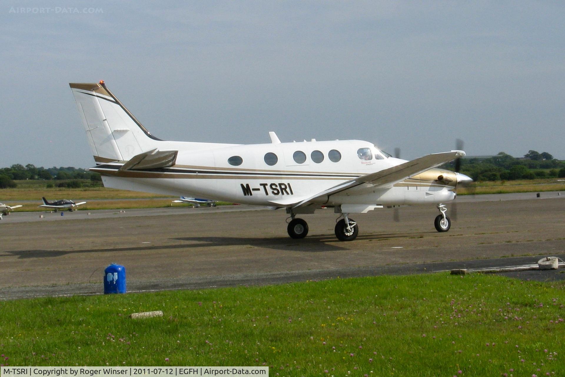 M-TSRI, 2006 Raytheon C90GT King Air King Air C/N LJ-1795, King Air taxying prior to departure. Operated by Timpson. De-registered and M-TSRI applied to C90GTI King Air s/n LJ-2033 on 11/01/2012.