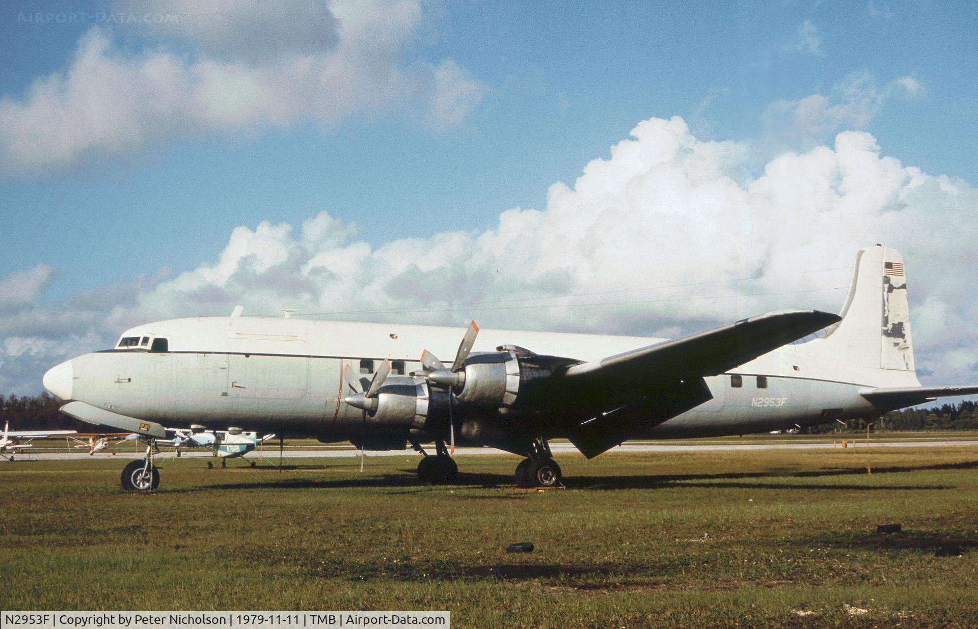 N2953F, 1953 Douglas VC-118A Liftmaster (DC-6A) C/N 44637, VC-118A Liftmaster 53-3266 as seen at New Tamiami in November 1979.