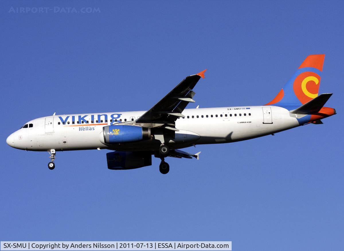 SX-SMU, 1993 Airbus A320-231 C/N 414, On final approach for runway 01L.