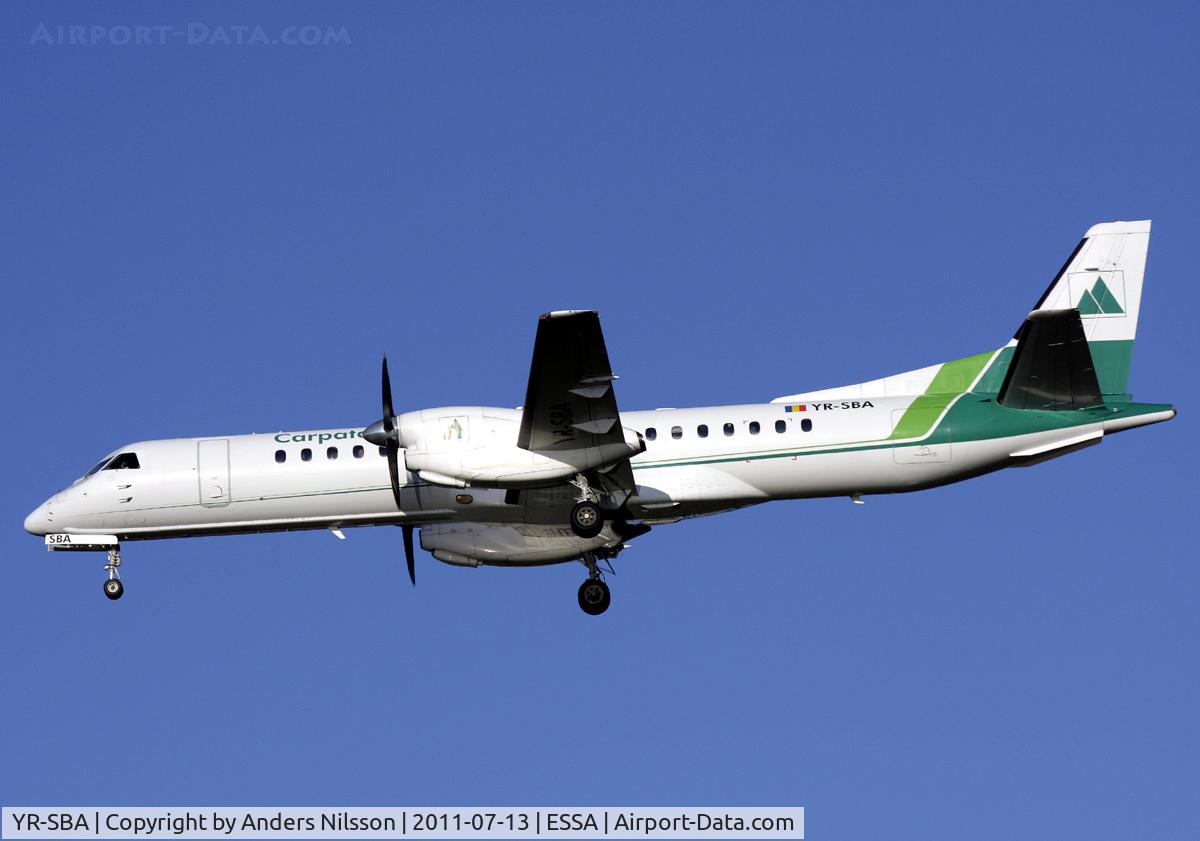 YR-SBA, 1996 Saab 2000 C/N 2000-038, On final approach for runway 01L.