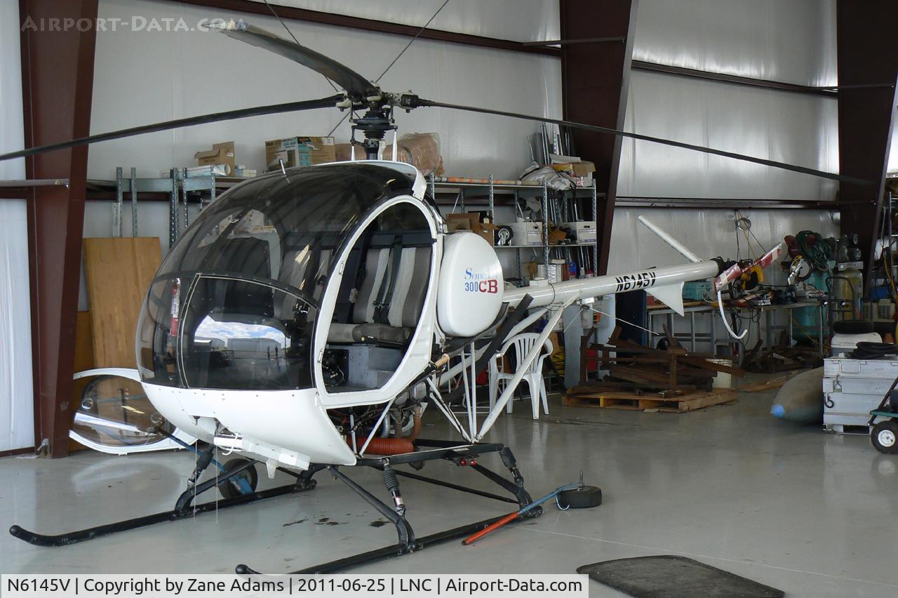 N6145V, 1996 Schweizer 269C-1 C/N 0045, In the Cold War Air Museum hanger at Lancaster Municipal Airport