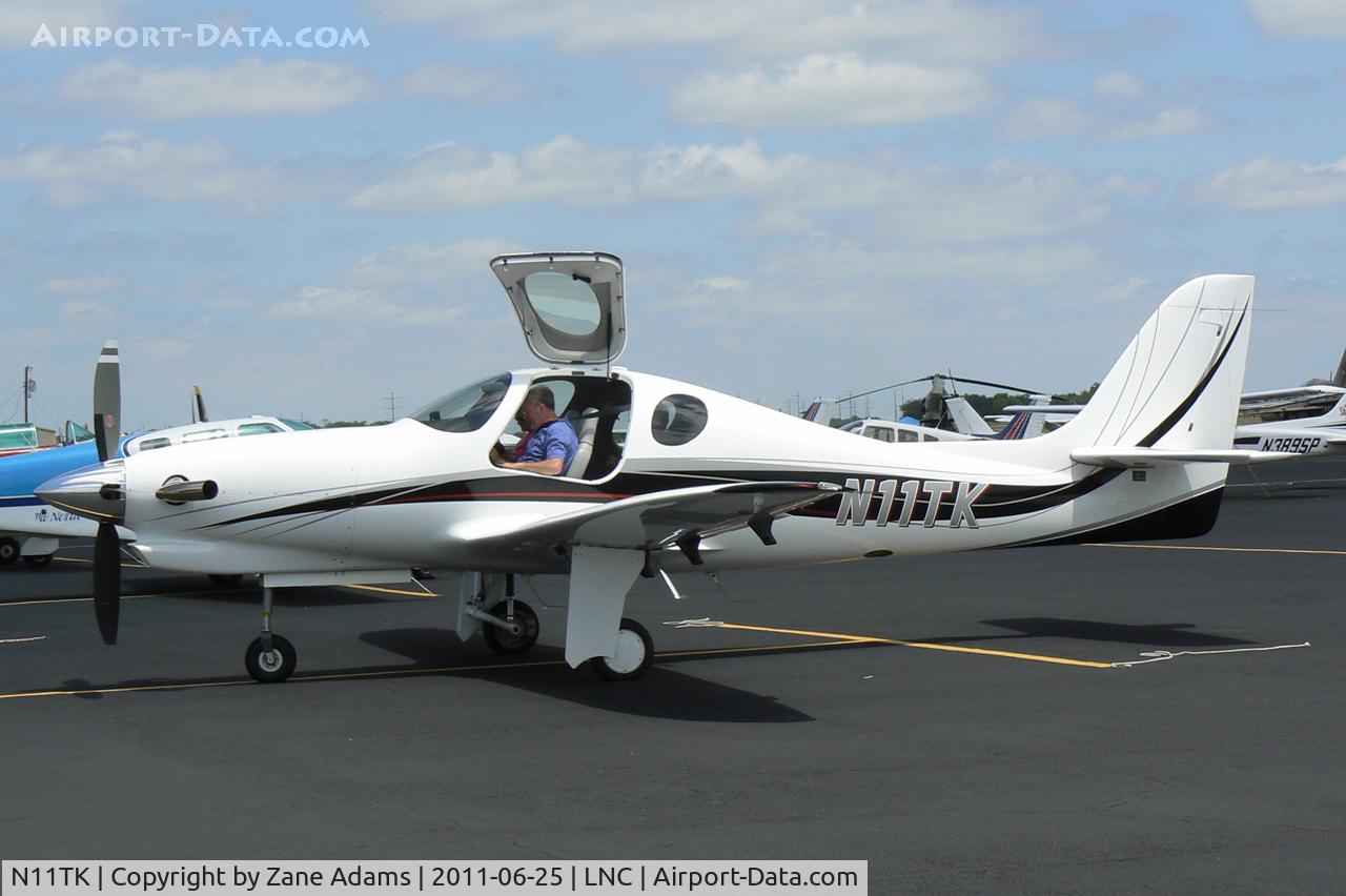N11TK, Lancair Evolution C/N EVO-006, At the Lancaster Municipal Airport open house.