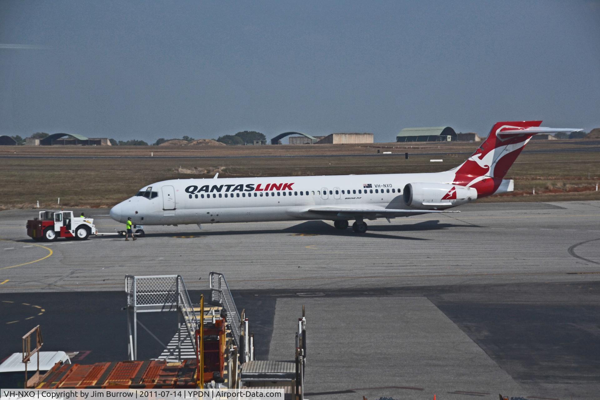 VH-NXO, 2001 Boeing 717-231 C/N 55096, Push back at Darwin