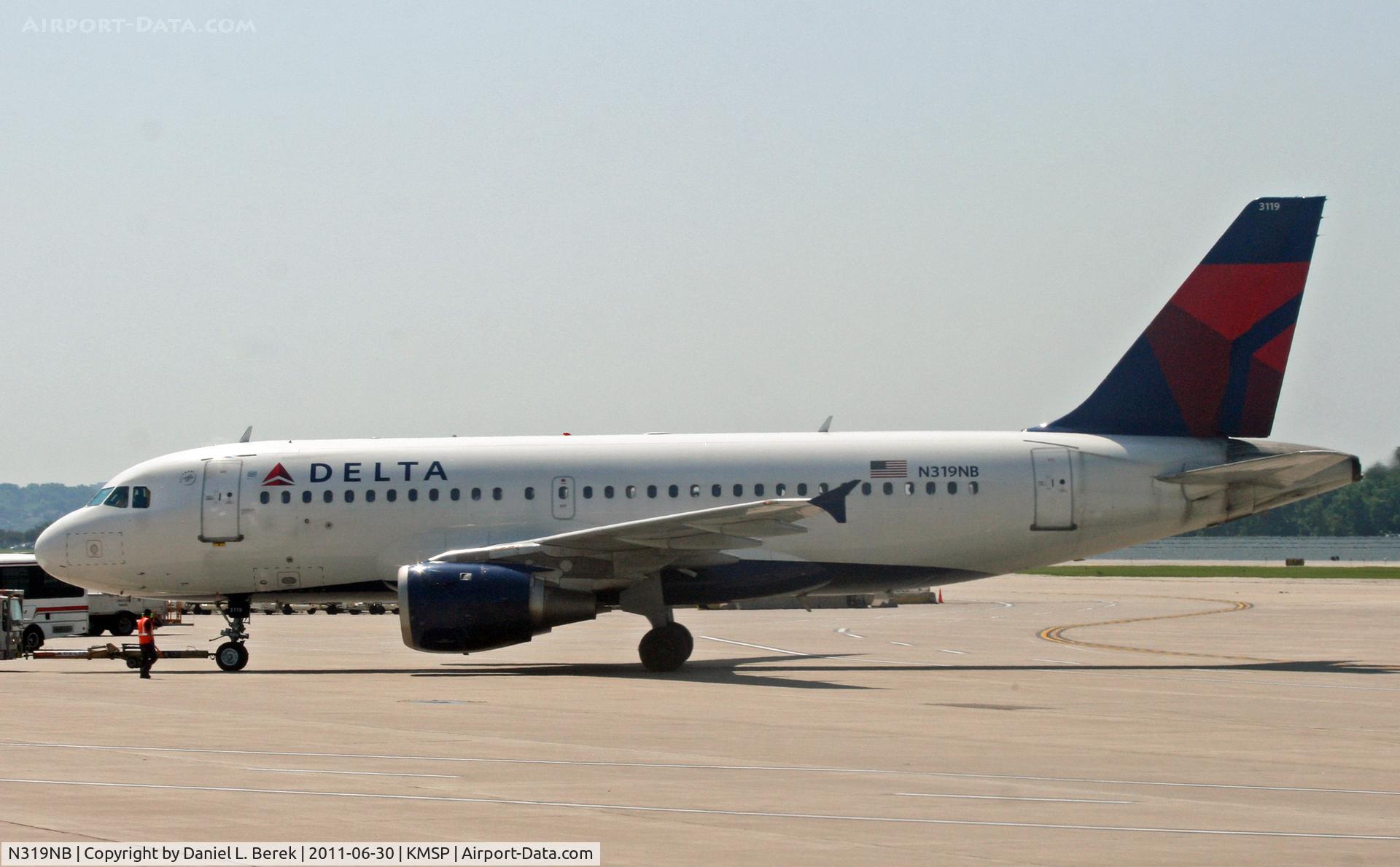 N319NB, 2000 Airbus A319-114 C/N 1346, A former NWA Airbus A320 is pushed back for another flight from MSP.