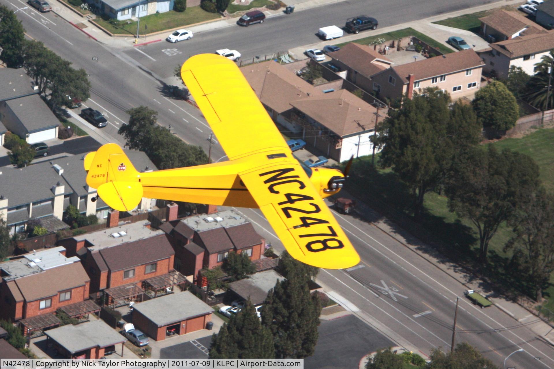 N42478, 1945 Piper J3C-65 Cub C/N 14747, Over Lompoc