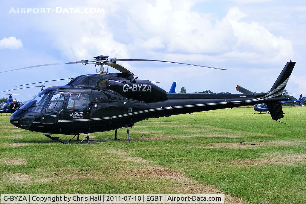 G-BYZA, 1992 Aerospatiale AS-355F-2 Ecureuil 2 C/N 5518, being used for ferrying race fans to the British F1 Grand Prix at Silverstone
