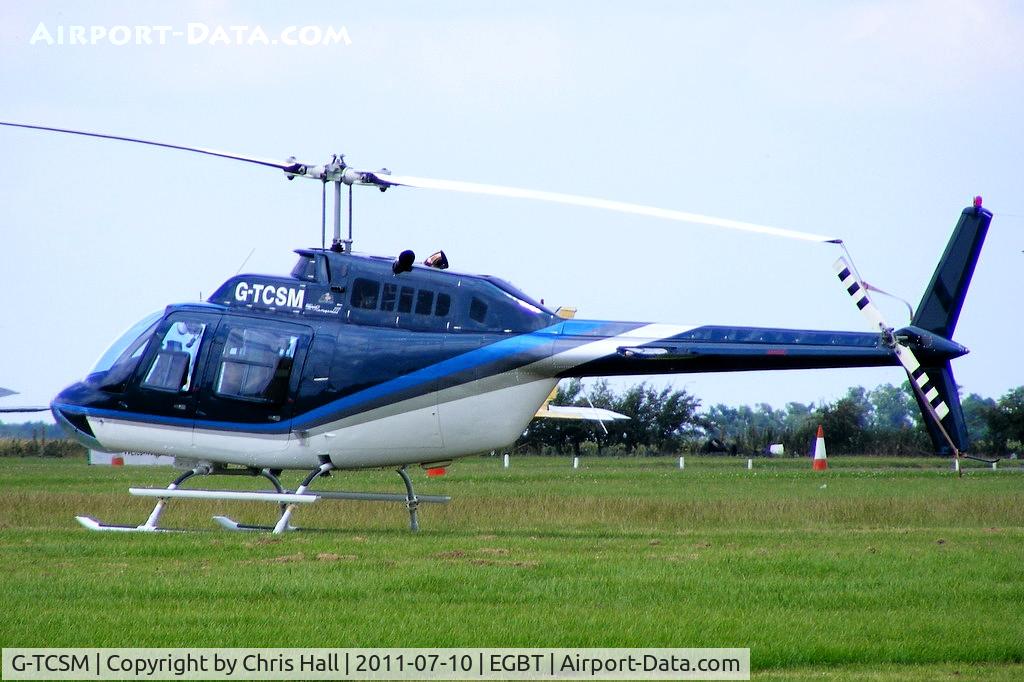 G-TCSM, 1985 Bell 206B JetRanger III C/N 3881, being used for ferrying race fans to the British F1 Grand Prix at Silverstone