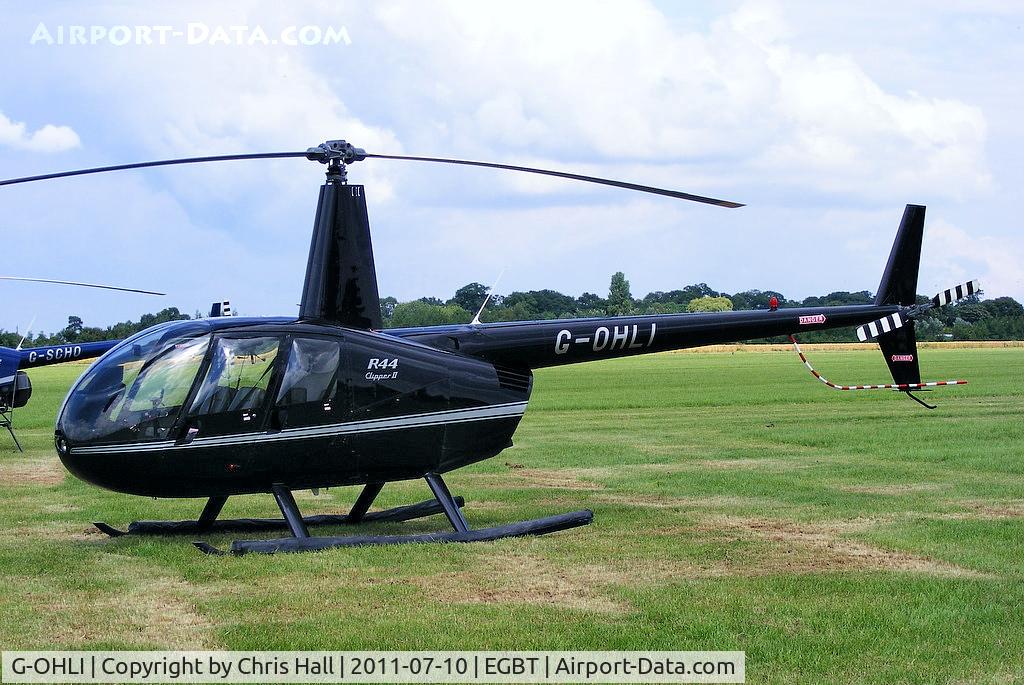 G-OHLI, 2005 Robinson R44 Clipper II C/N 10832, being used for ferrying race fans to the British F1 Grand Prix at Silverstone