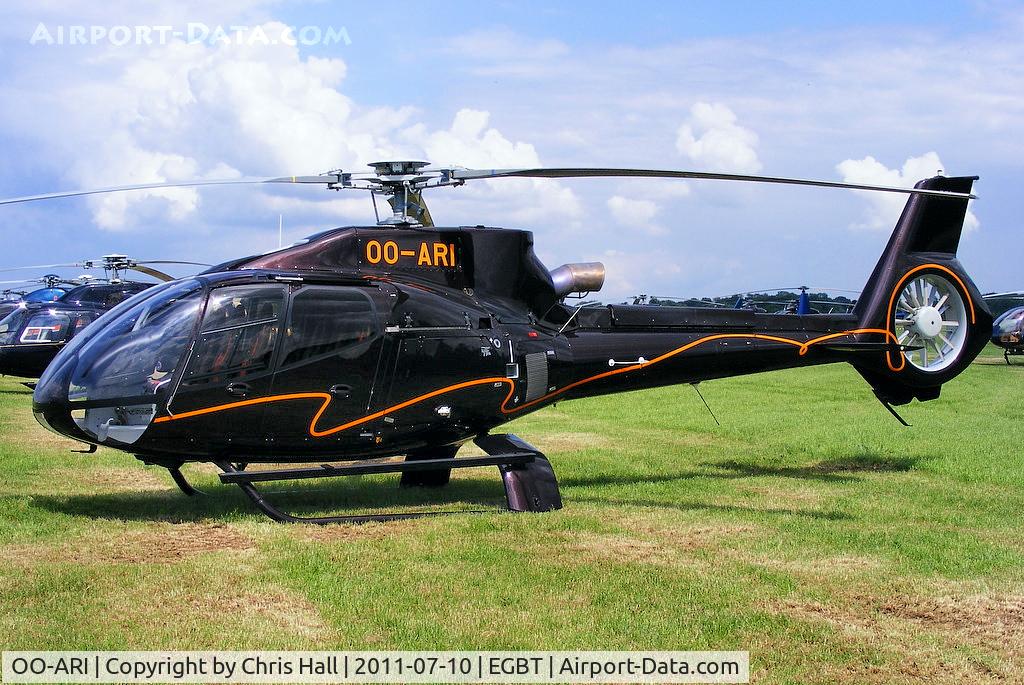 OO-ARI, 2009 Eurocopter EC-130B-4 (AS-350B-4) C/N 4772, being used for ferrying race fans to the British F1 Grand Prix at Silverstone