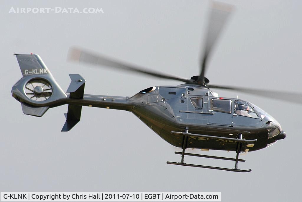 G-KLNK, 2007 Eurocopter EC-135P-2+ C/N 0550, being used for ferrying race fans to the British F1 Grand Prix at Silverstone