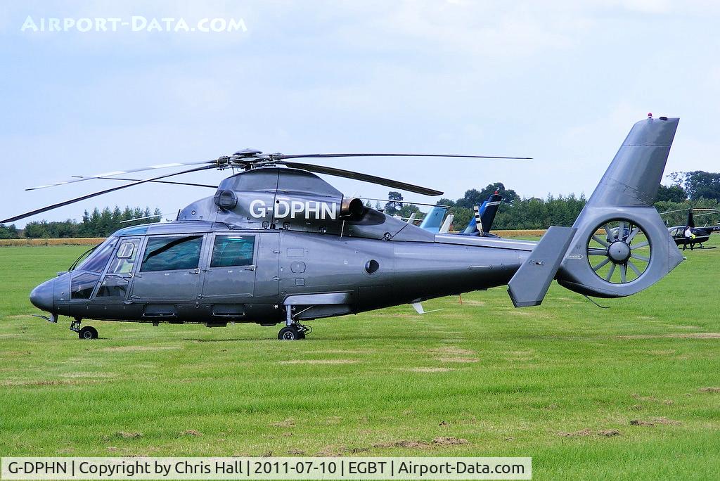 G-DPHN, 1988 Aerospatiale SA-365N-1 Dauphin 2 C/N 6307, being used for ferrying race fans to the British F1 Grand Prix at Silverstone