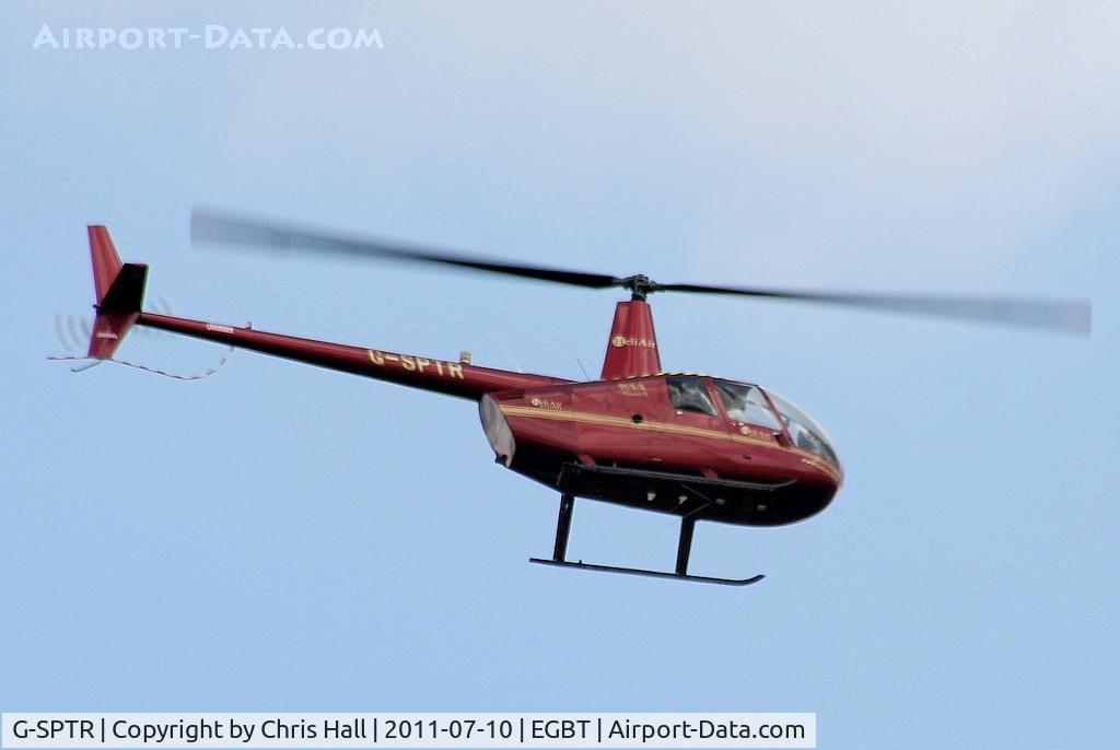 G-SPTR, 2009 Robinson R44 Raven II C/N 12799, being used for ferrying race fans to the British F1 Grand Prix at Silverstone