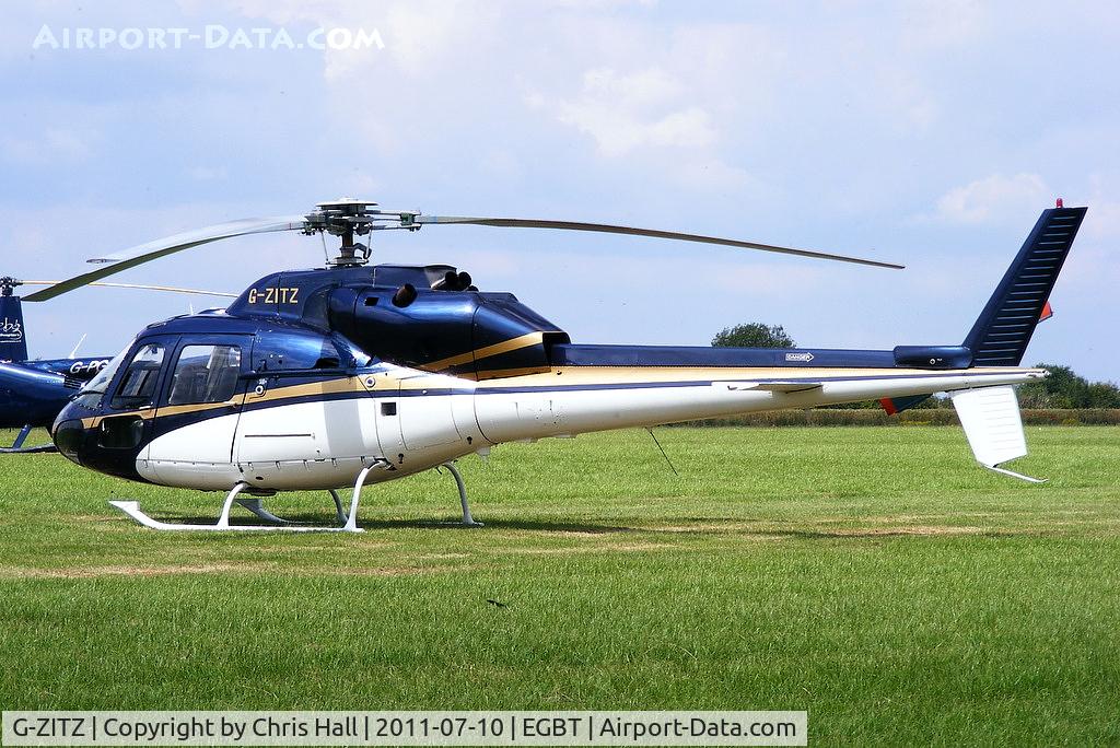 G-ZITZ, 1983 Aerospatiale AS-355F-2 Ecureuil 2 C/N 5135, being used for ferrying race fans to the British F1 Grand Prix at Silverstone