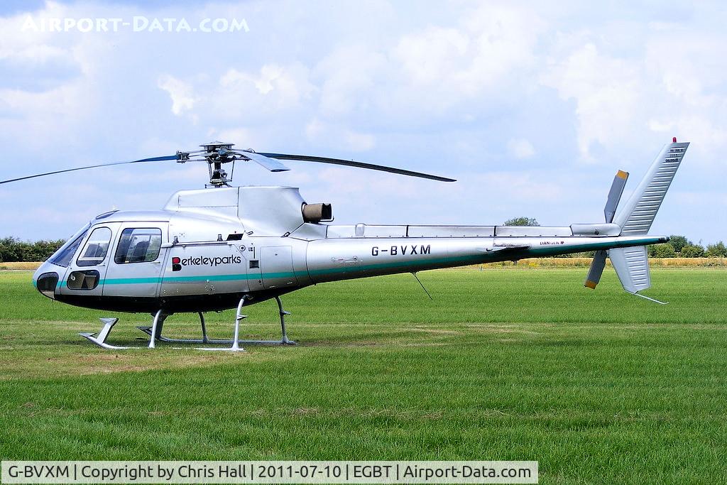 G-BVXM, 1987 Aerospatiale AS-350B Ecureuil C/N 2013, being used for ferrying race fans to the British F1 Grand Prix at Silverstone
