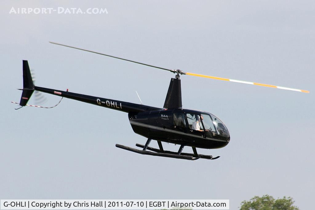 G-OHLI, 2005 Robinson R44 Clipper II C/N 10832, being used for ferrying race fans to the British F1 Grand Prix at Silverstone