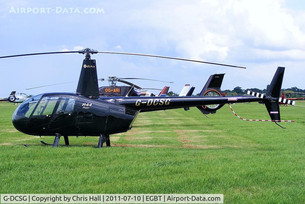 G-DCSG, 2000 Robinson R44 Raven C/N 0960, being used for ferrying race fans to the British F1 Grand Prix at Silverstone