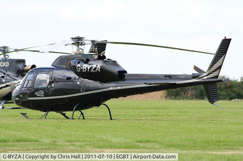 G-BYZA, 1992 Aerospatiale AS-355F-2 Ecureuil 2 C/N 5518, being used for ferrying race fans to the British F1 Grand Prix at Silverstone