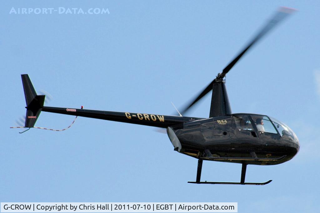G-CROW, 2000 Robinson R44 Astro C/N 0754, being used for ferrying race fans to the British F1 Grand Prix at Silverstone