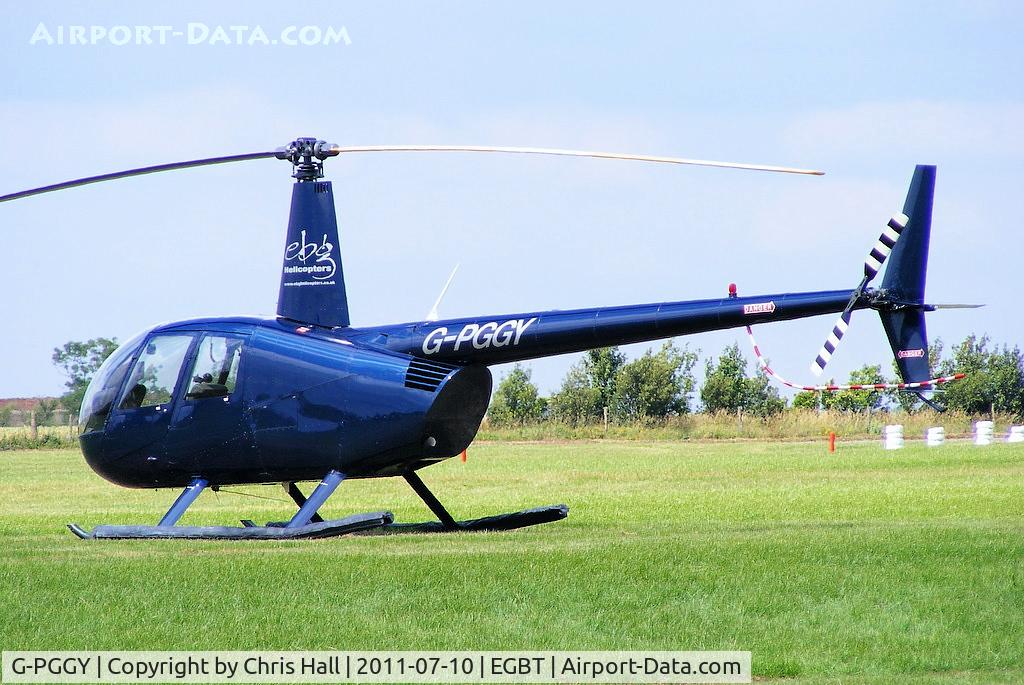 G-PGGY, 2006 Robinson R44 Clipper II C/N 11115, being used for ferrying race fans to the British F1 Grand Prix at Silverstone