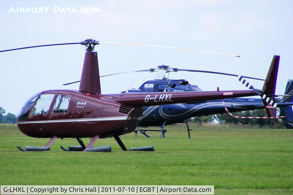 G-LHXL, 2007 Robinson R44 Raven C/N 1702, being used for ferrying race fans to the British F1 Grand Prix at Silverstone