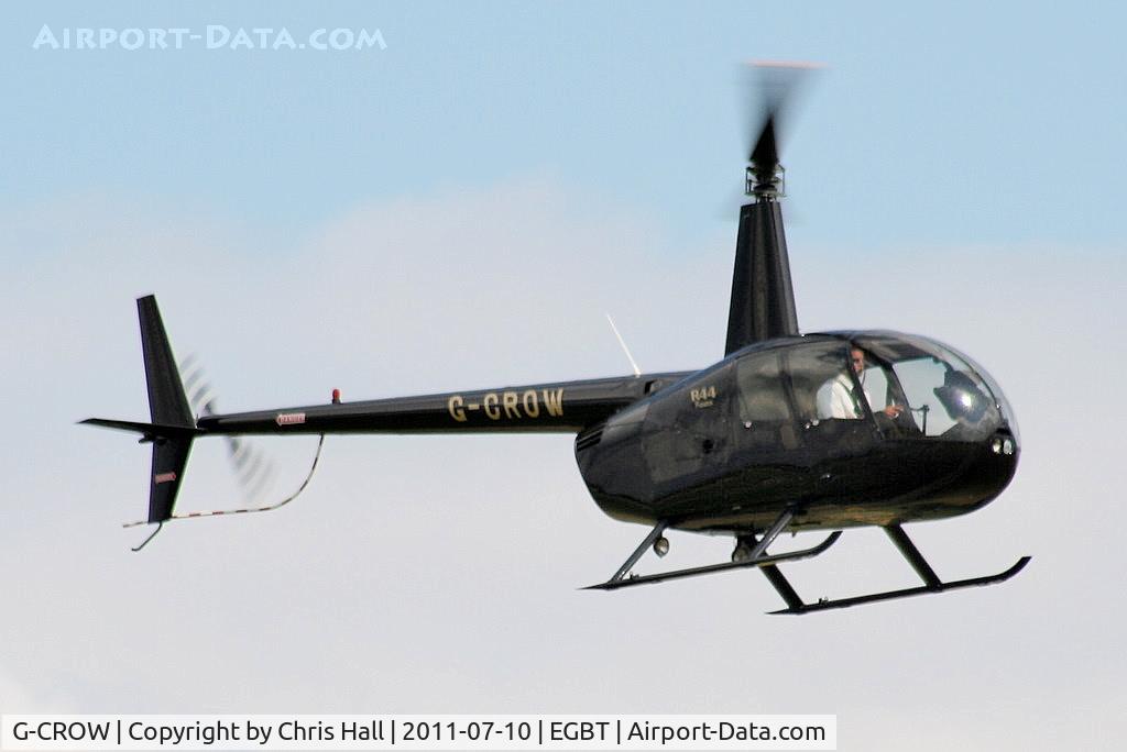 G-CROW, 2000 Robinson R44 Astro C/N 0754, being used for ferrying race fans to the British F1 Grand Prix at Silverstone
