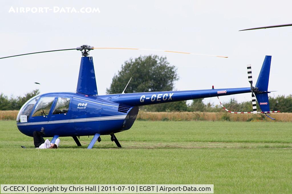 G-CECX, 2006 Robinson R44 Raven II C/N 11390, being used for ferrying race fans to the British F1 Grand Prix at Silverstone