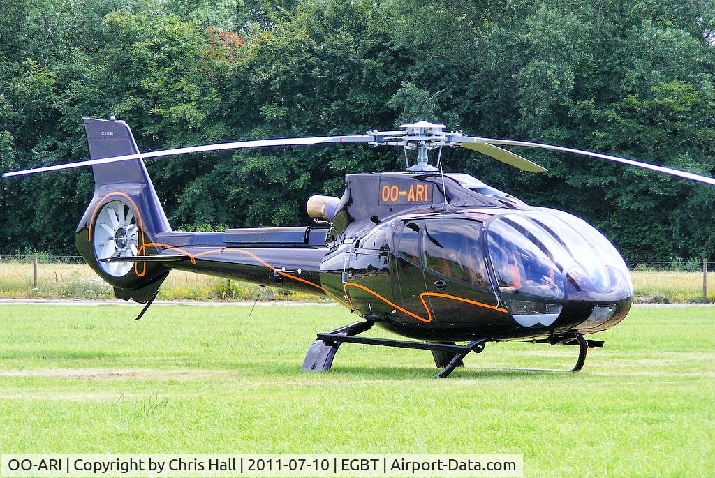OO-ARI, 2009 Eurocopter EC-130B-4 (AS-350B-4) C/N 4772, being used for ferrying race fans to the British F1 Grand Prix at Silverstone