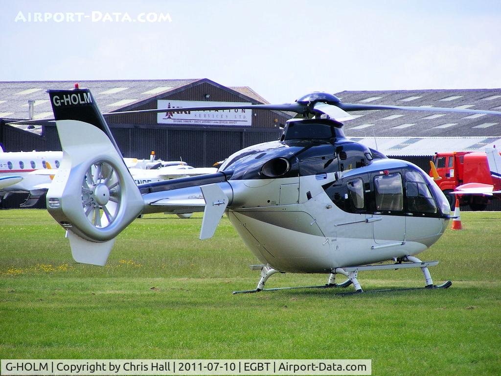 G-HOLM, 2007 Eurocopter EC-135T-2+ C/N 0574, being used for ferrying race fans to the British F1 Grand Prix at Silverstone