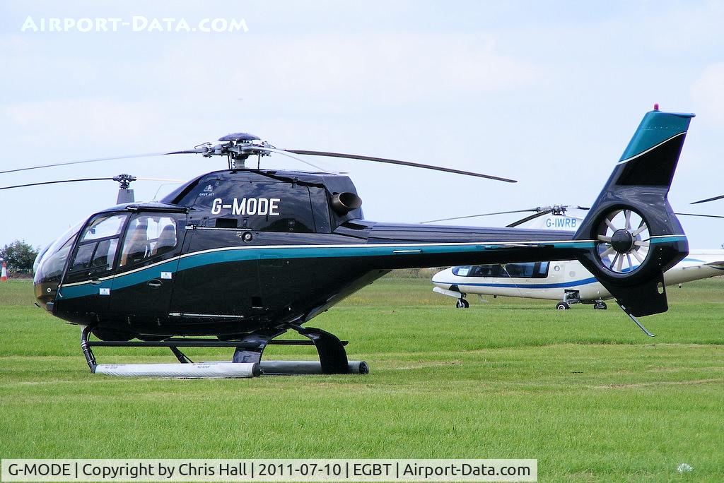 G-MODE, 2002 Eurocopter EC-120B Colibri C/N 1295, being used for ferrying race fans to the British F1 Grand Prix at Silverstone