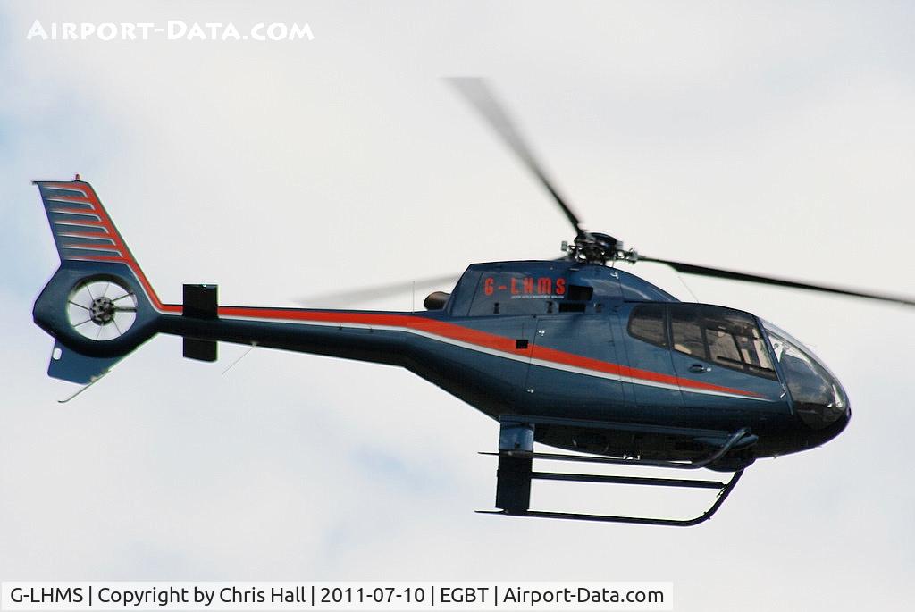 G-LHMS, 2006 Eurocopter EC-120B Colibri C/N 1442, being used for ferrying race fans to the British F1 Grand Prix at Silverstone