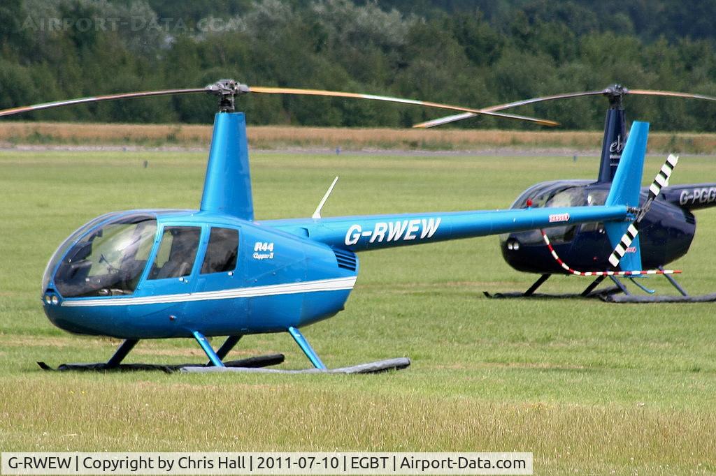 G-RWEW, 2006 Robinson R44 Clipper II C/N 11148, being used for ferrying race fans to the British F1 Grand Prix at Silverstone