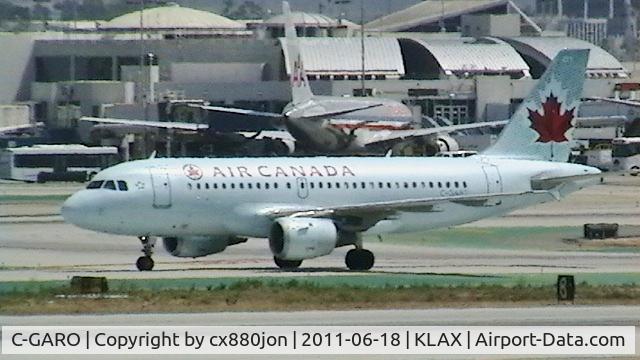 C-GARO, 1997 Airbus A319-114 C/N 757, C-GARO slows down on Runway 25L
