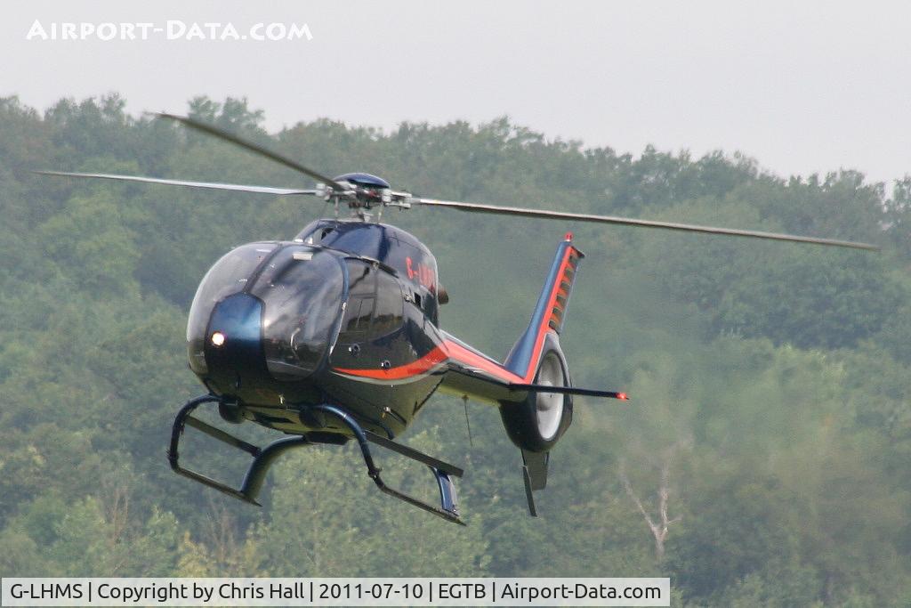G-LHMS, 2006 Eurocopter EC-120B Colibri C/N 1442, being used for ferrying race fans to the British F1 Grand Prix at Silverstone