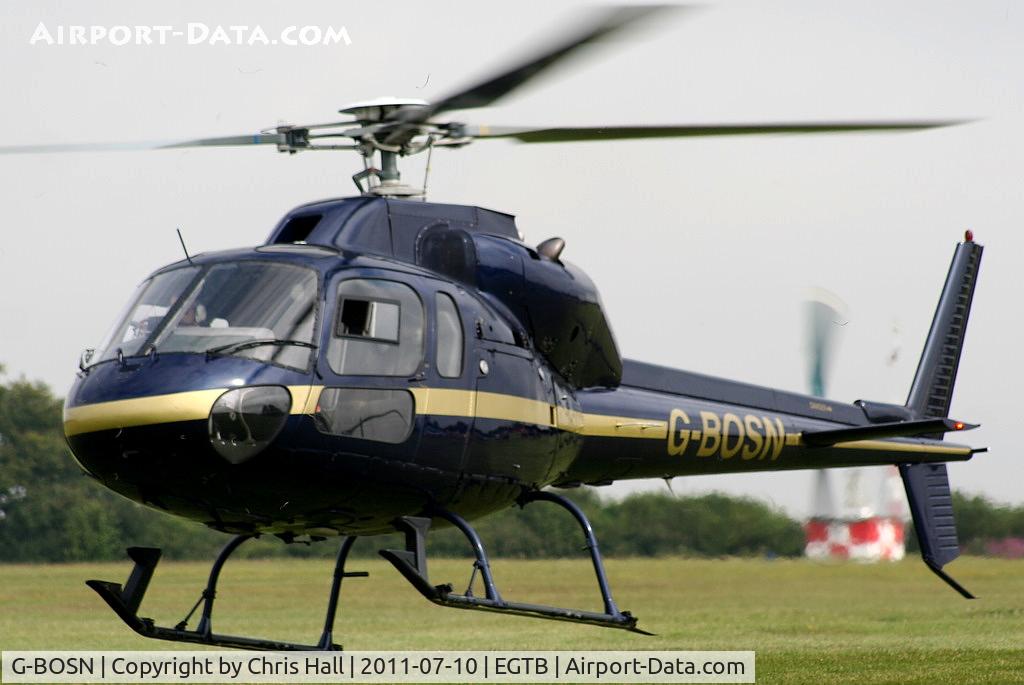 G-BOSN, 1982 Aerospatiale AS-355F-1 Ecureuil 2 C/N 5266, being used for ferrying race fans to the British F1 Grand Prix at Silverstone