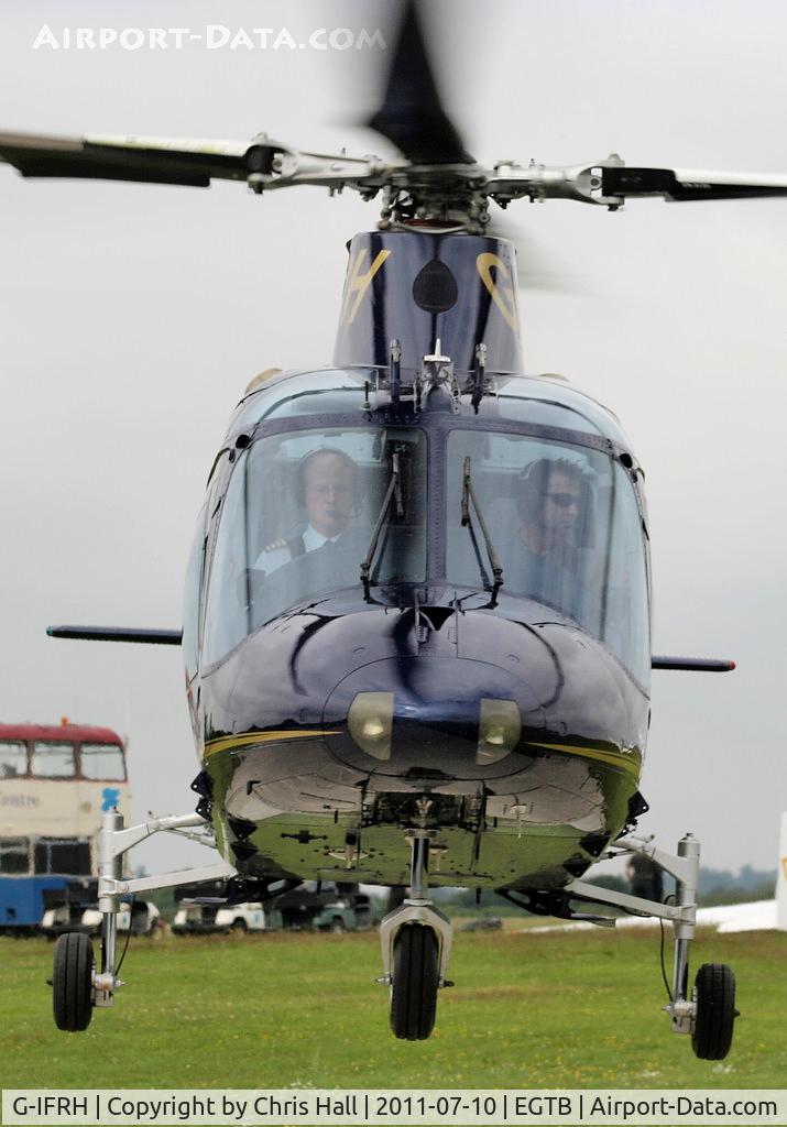 G-IFRH, 1990 Agusta A-109C C/N 7619, being used for ferrying race fans to the British F1 Grand Prix at Silverstone