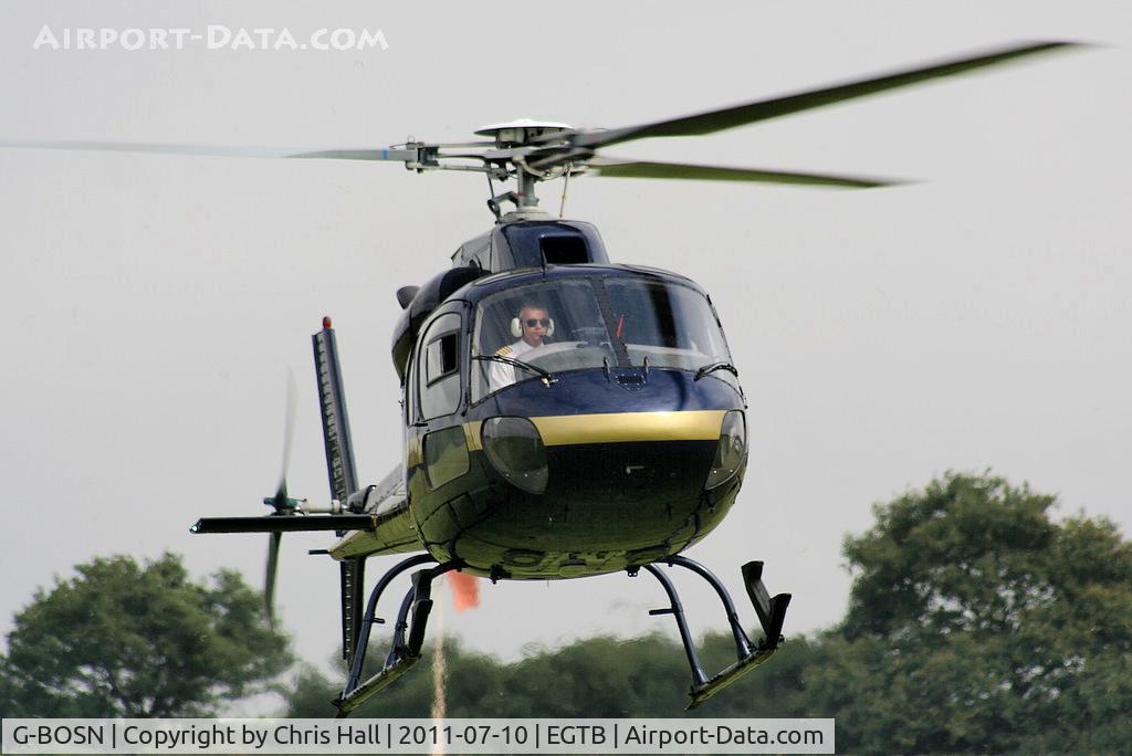 G-BOSN, 1982 Aerospatiale AS-355F-1 Ecureuil 2 C/N 5266, being used for ferrying race fans to the British F1 Grand Prix at Silverstone