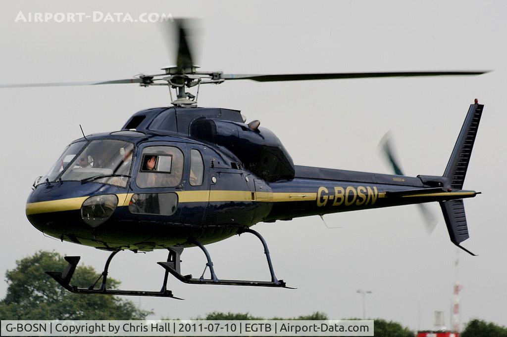 G-BOSN, 1982 Aerospatiale AS-355F-1 Ecureuil 2 C/N 5266, being used for ferrying race fans to the British F1 Grand Prix at Silverstone