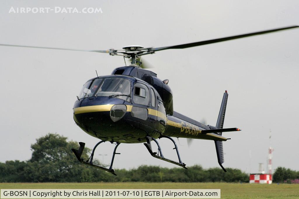 G-BOSN, 1982 Aerospatiale AS-355F-1 Ecureuil 2 C/N 5266, being used for ferrying race fans to the British F1 Grand Prix at Silverstone