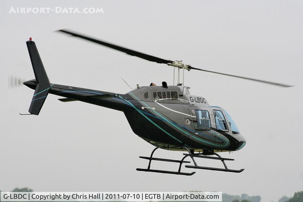 G-LBDC, 1984 Bell 206B JetRanger III C/N 3806, being used for ferrying race fans to the British F1 Grand Prix at Silverstone