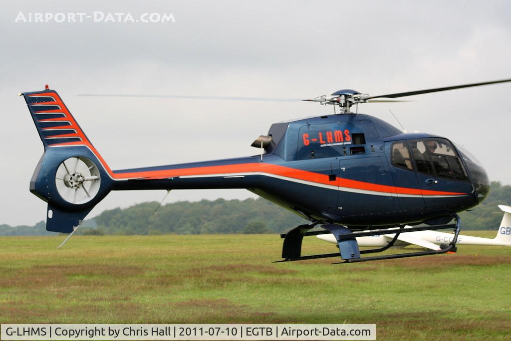 G-LHMS, 2006 Eurocopter EC-120B Colibri C/N 1442, being used for ferrying race fans to the British F1 Grand Prix at Silverstone
