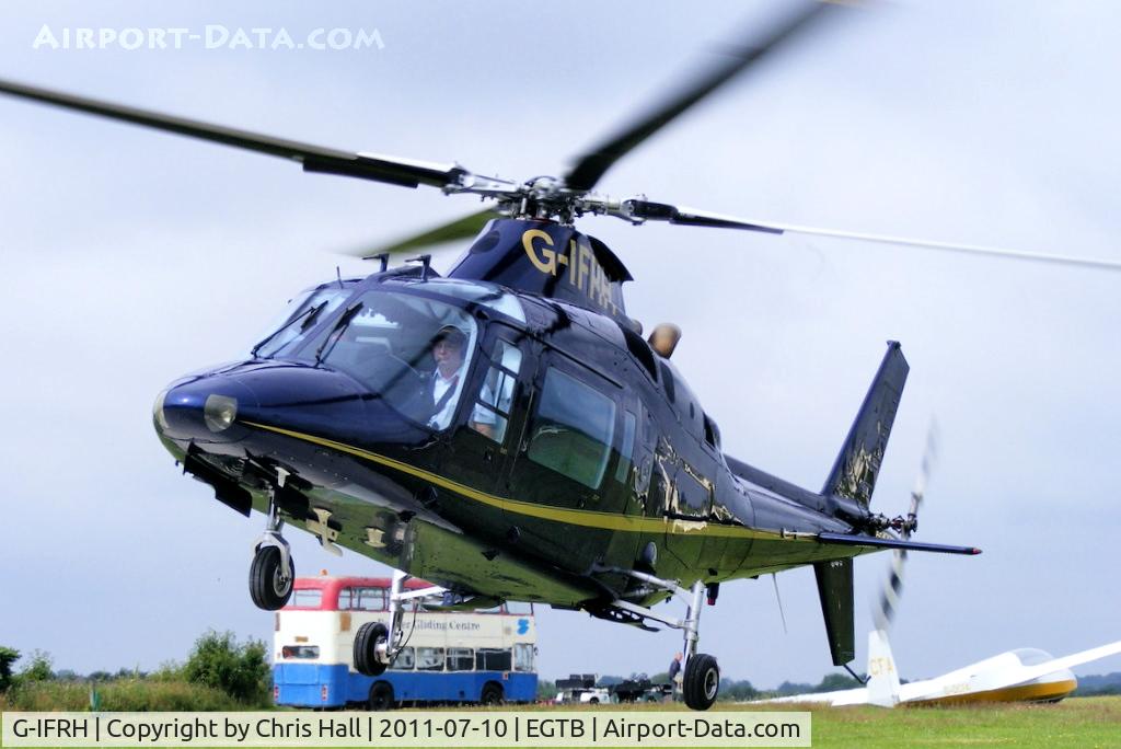 G-IFRH, 1990 Agusta A-109C C/N 7619, being used for ferrying race fans to the British F1 Grand Prix at Silverstone