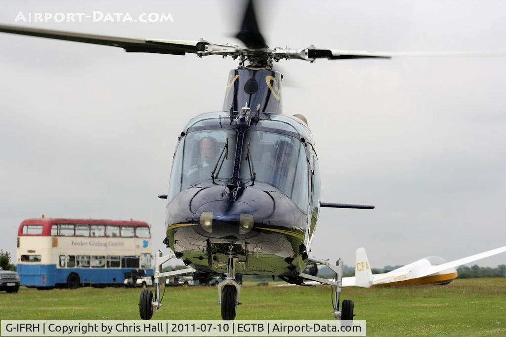 G-IFRH, 1990 Agusta A-109C C/N 7619, being used for ferrying race fans to the British F1 Grand Prix at Silverstone
