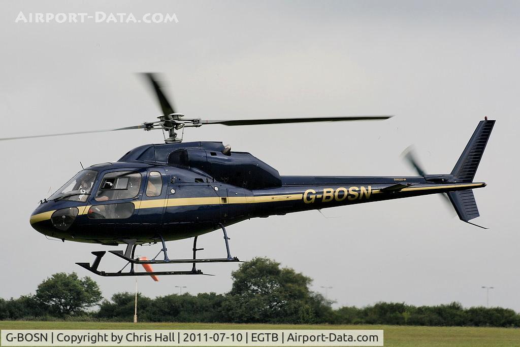 G-BOSN, 1982 Aerospatiale AS-355F-1 Ecureuil 2 C/N 5266, being used for ferrying race fans to the British F1 Grand Prix at Silverstone