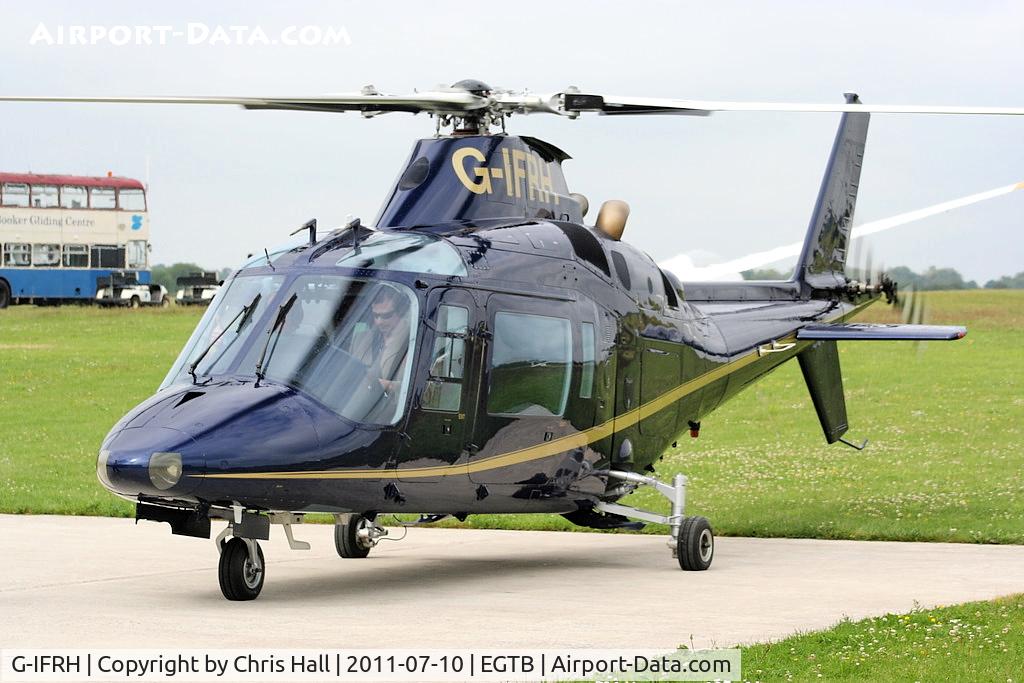 G-IFRH, 1990 Agusta A-109C C/N 7619, being used for ferrying race fans to the British F1 Grand Prix at Silverstone